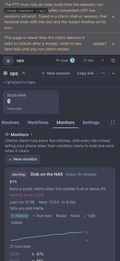 The Monitors tab on a phone in the dark theme: the alerting disk with its history open.